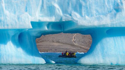Out of the Northwest Passage Zodiac and Iceberg