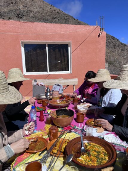 Women having group meal on a rooftop in Morocco