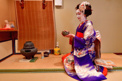 A Japanese woman in Maiko's costume and hair style