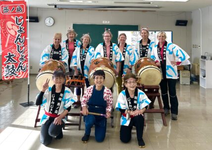 Group shot of Taiko women drumming_edited